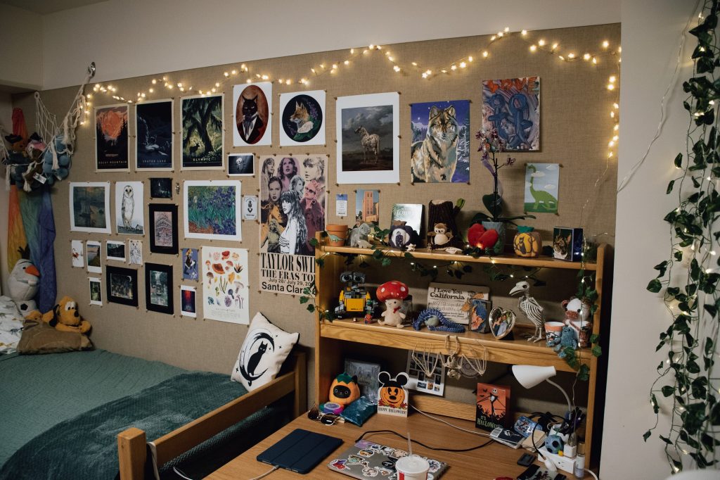 Her room stands out with her layout of posters that feature soft colors and abstract art. "I wanted to make a cozy space that could feel like home, so I used a lot of calming colors, stuffed animals and soft lights," Wasserman said.