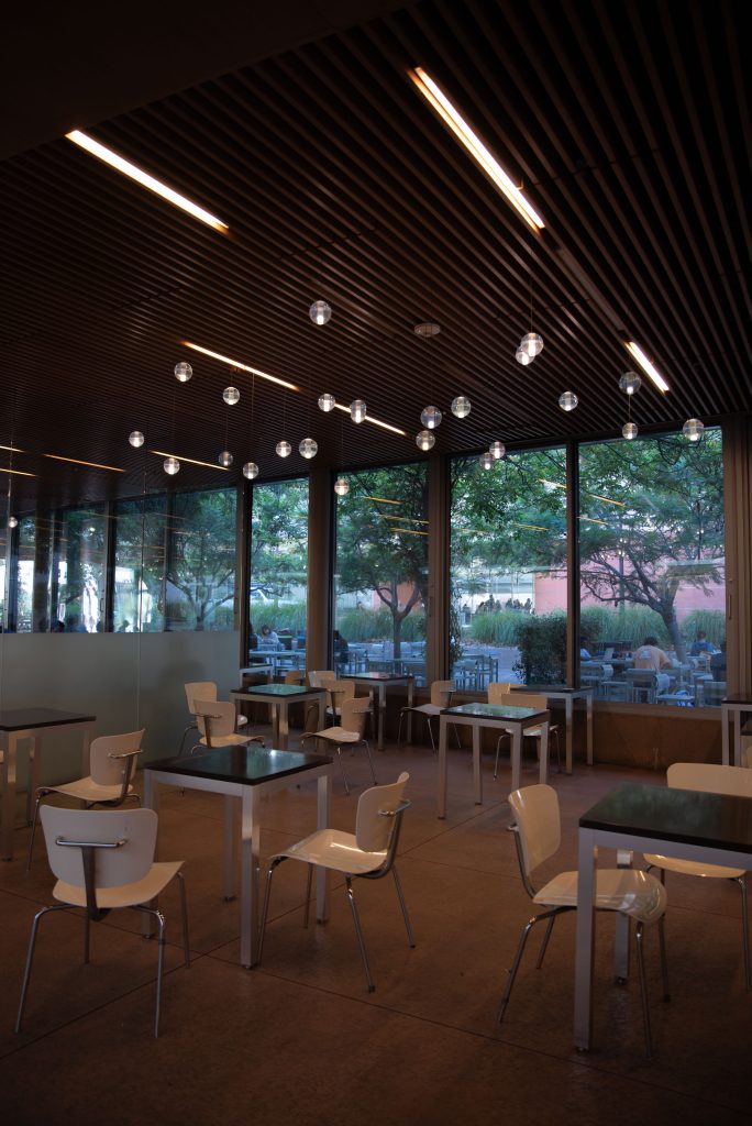 The indoor seating is lit with warm-colored lighting to create an ambient environment for people to eat, study and socialize. Opened in 1974-1975, the “Bombshelter Deli and Burger Bar” was one of the first eateries on the south side of campus.