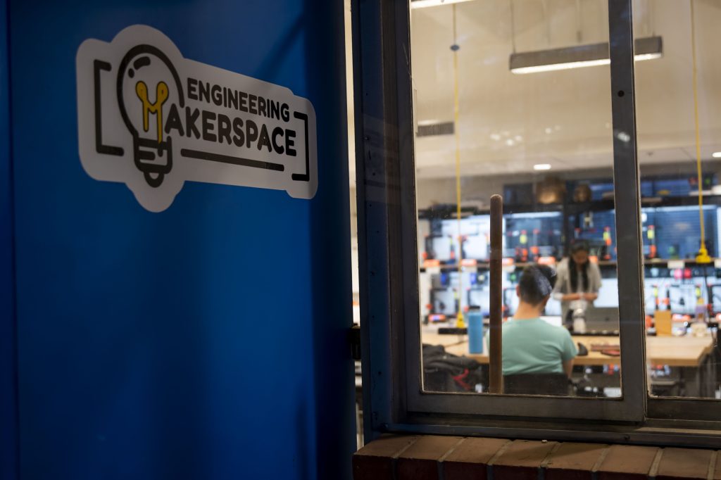 On the second floor of Boelter Hall, the Engineering Makerspace sign is outside the veritable wall of 3D printers used to meet students’ assignment, project and recreational needs. Operating on a first-come first-serve basis, the printing queue is often fully populated with print requests.