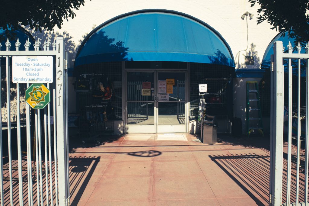 The gates to UCLA Thrift Shop stand open, showing the entrance of the store. “The store is associated with the UCLA hospital, not the school, but UCLA students often come by and ask if this is the ‘UCLA thrift store,’” mentioned Fernanda, a friendly clerk at the thrift shop.