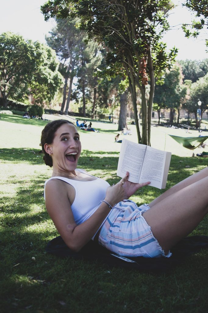 Gianna Karkafi, a first-year student studying neuroscience, is reading "A Secret History" by Donna Tartt on the lawn. “I like to sit outside in the shade on Janss. I&squot;m amongst people but in my own little world.”