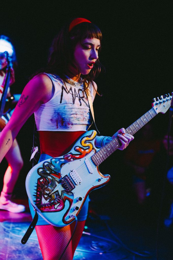 Sporting a trendy and colorful hand-painted electric guitar, MARIS steals the show. She performed a variety of her released singles, alongside a cover of The Killers&squot; "Mr. Brightside."