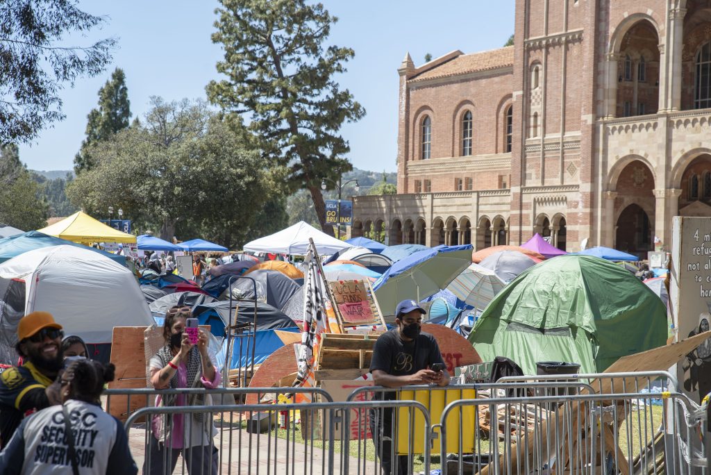 Around 50 tents are erected on the grass in Dickson Plaza. The encampment housed pro-Palestine protesters overnight for the past five days. Photographed by Emily Chandler/BruinLife.