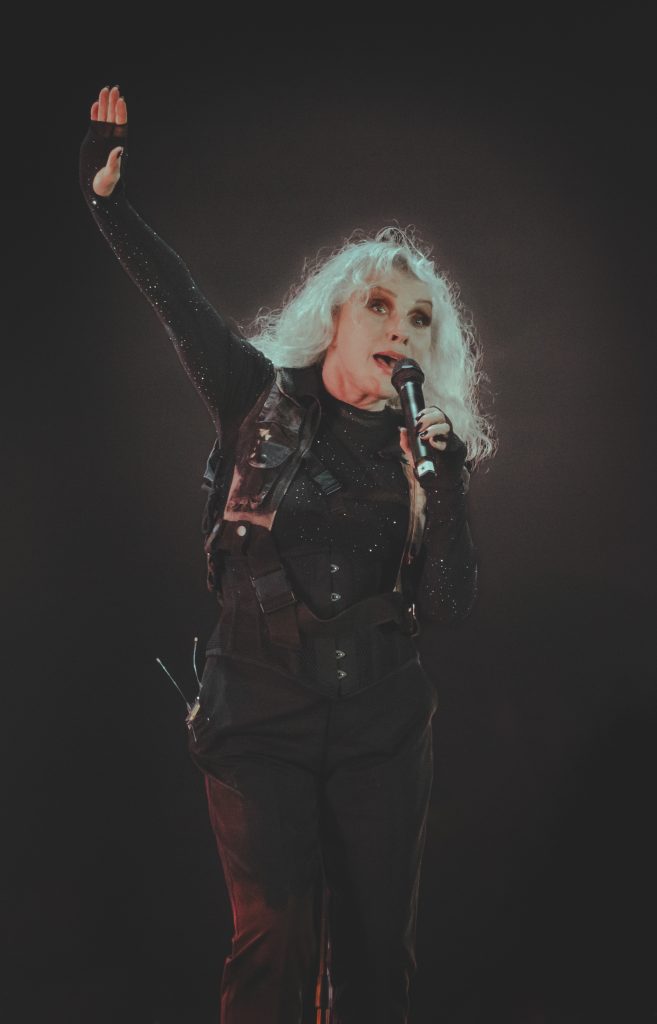 Debbie Harry of Blondie waves along with the masses gathered at Cruel World's Outsiders stage. Harry commanded the stage throughout her set. Photographed by Cathryn Kuczynski/BruinLife