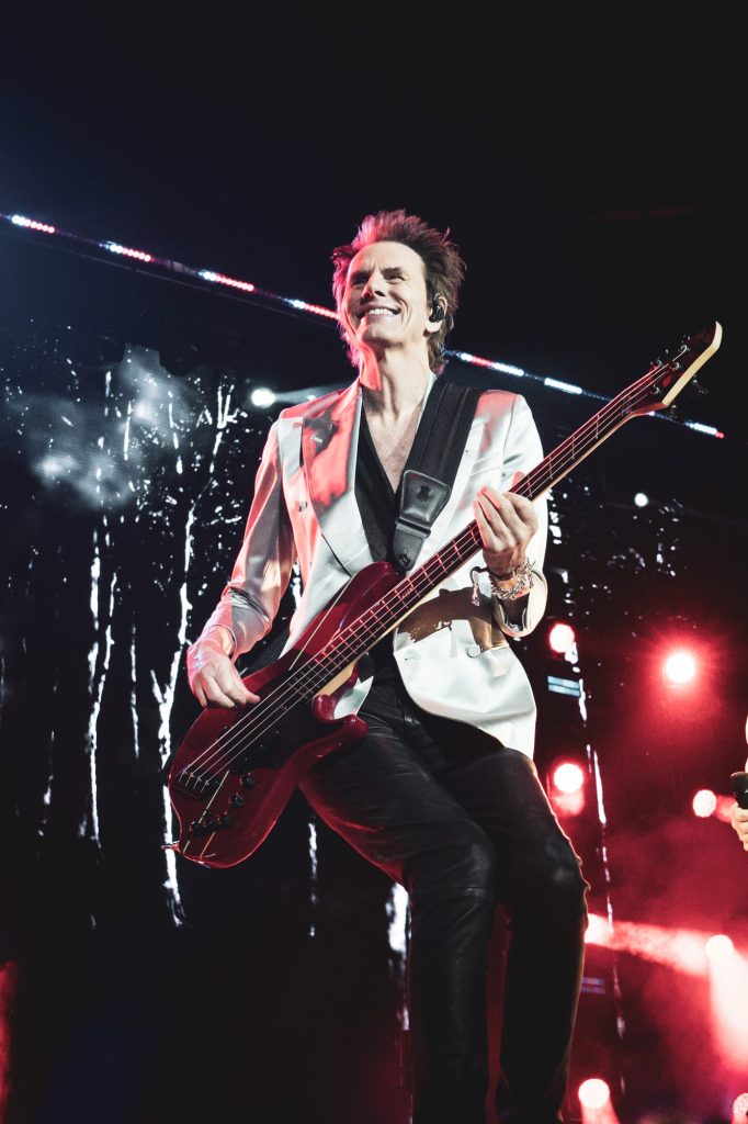 John Taylor dazzles the crowd of the Outsiders Stage as he rocks along to "Hungry Like The Wolf." Photographed by Cathryn Kuczynski/BruinLife