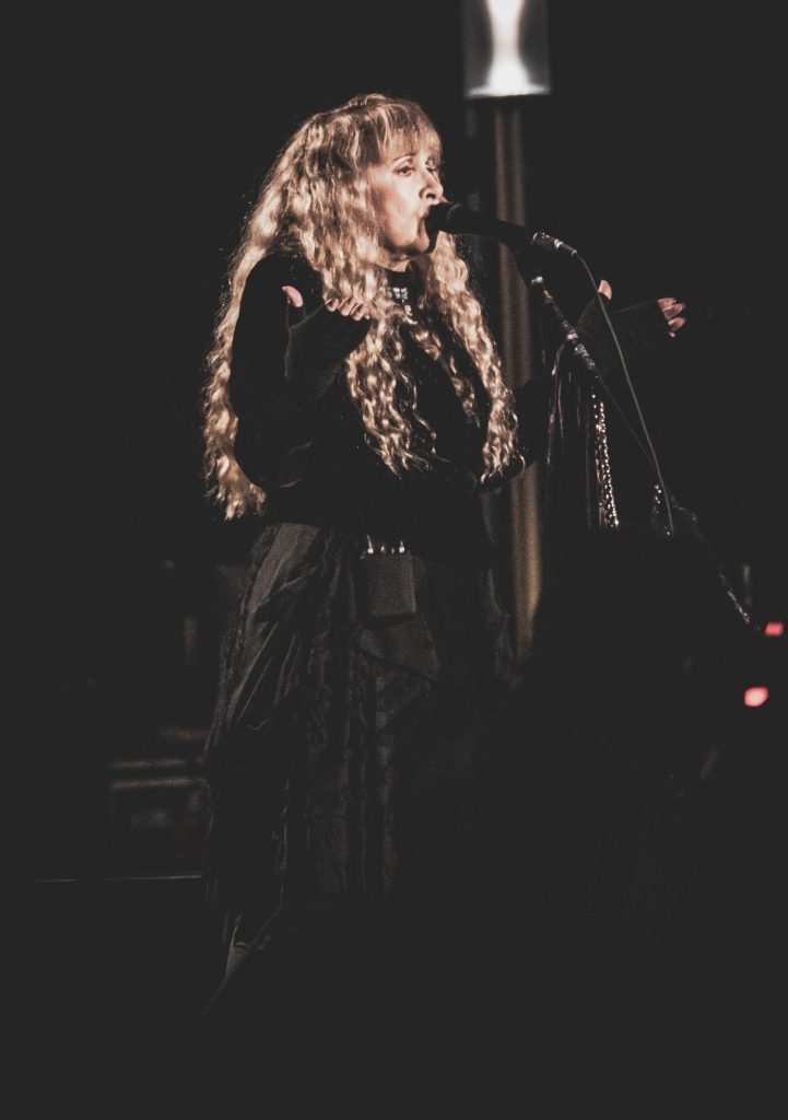 Fleetwood Mac frontwoman Stevie Nicks takes the stage as the final act of the night for a classic hit-filled performance that attracted nearly every festival attendee. Photographed by Cathryn Kuczynski/BruinLife
