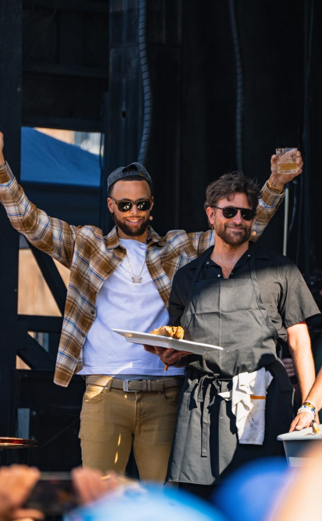 Basketball star Stephen Curry and Oscar nominated actor Bradley Cooper joined chef Jose Andres on stage at the Williams Sonoma stage to showcase some brilliant bourbon and delicious Philly cheesecakes.