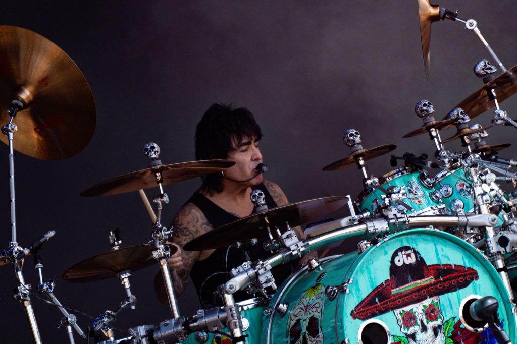 Alex González of Maná plays the first beats of the band's BottleRock set on a beautifully unique skull-adorned drum kit. Photographed by Cathryn Kuczynski/BruinLife