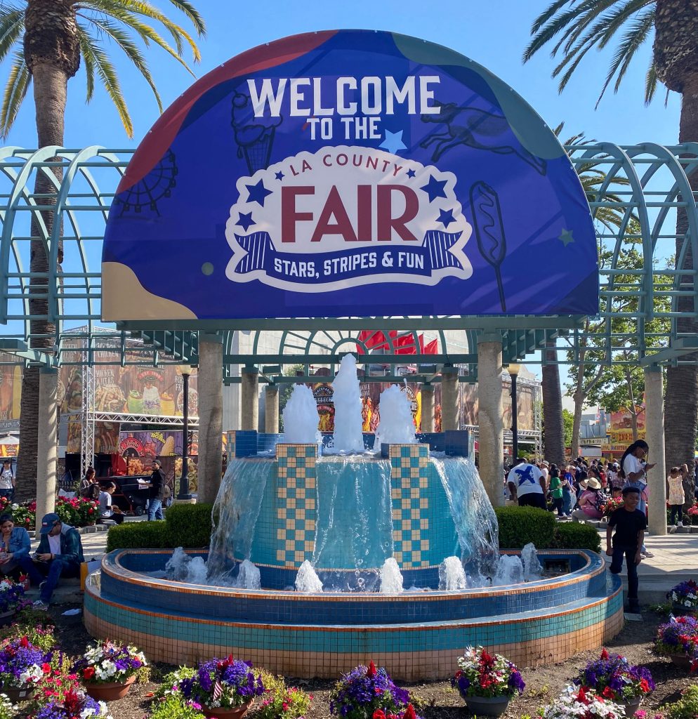A large "Welcome to the LA County Fair" greets fairgoers. This sign was one of many welcome signs present throughout the fairgrounds.