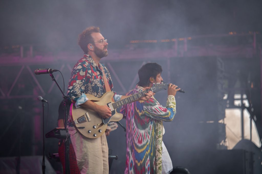 Lead vocalist, Sameer Gadhia, and guitarist, Jacob Tilley, join together during moments of their performance, building off of each other's energy. Photographed by Caleb Velasquez/BruinLife.