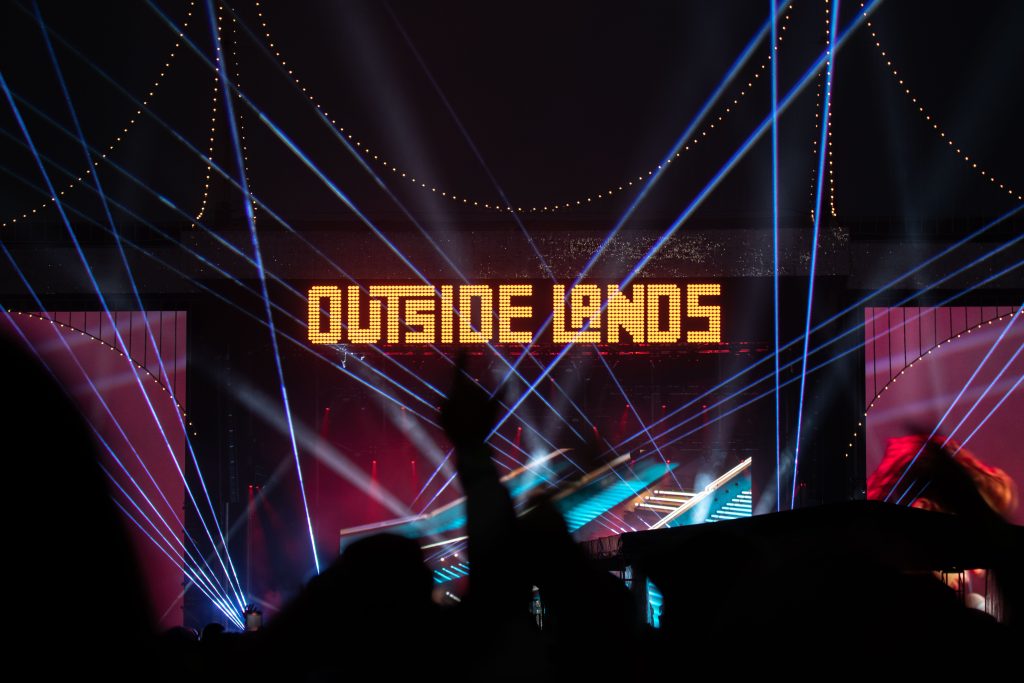 Lasers shoot up into the sky at Lands End Stage as the crowd roars with excitement, welcoming The Killers to close out the night of day 1. Photographed by Caleb Velasquez/BruinLife.