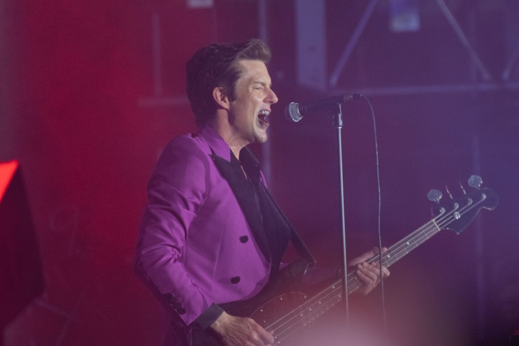 Lead vocalist of The Killers, Brandon Flowers, sang his heart out as he busted out the guitar. Photographed by Caleb Velasquez/BruinLife.