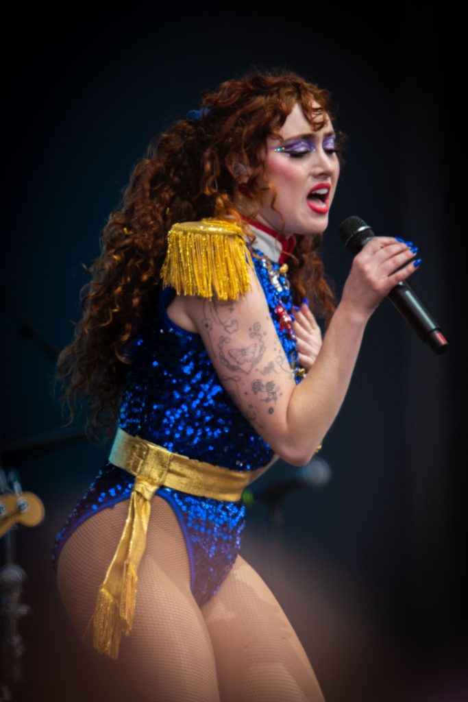 Chappell Roan sings with her hand on her heart as she gives an emotional performance of "Casual." Roan performed at the Lands End stage on day three of Outside Lands 2024. Photographed by Caleb Velasquez/BruinLife.