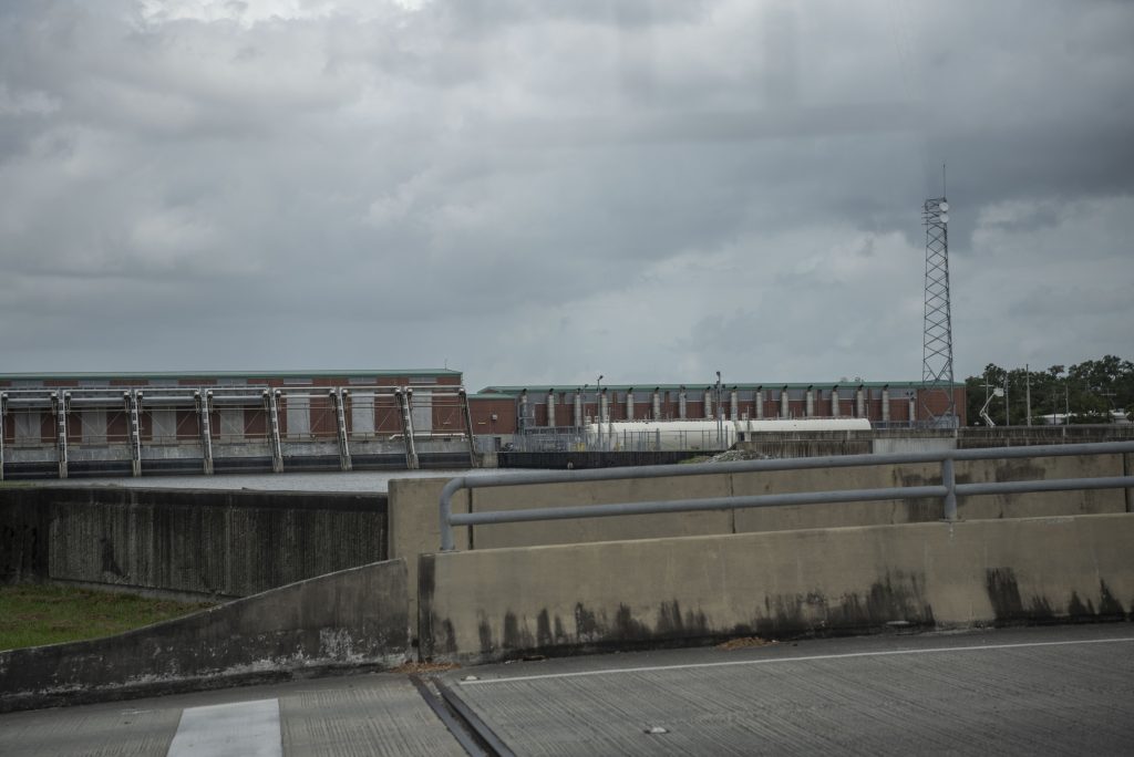 The dam spans the small river and can close during harsh storms or tornados. Many dams protected New Orleans neighborhoods from flooding. Photographed by Emily Chandler/BruinLife.