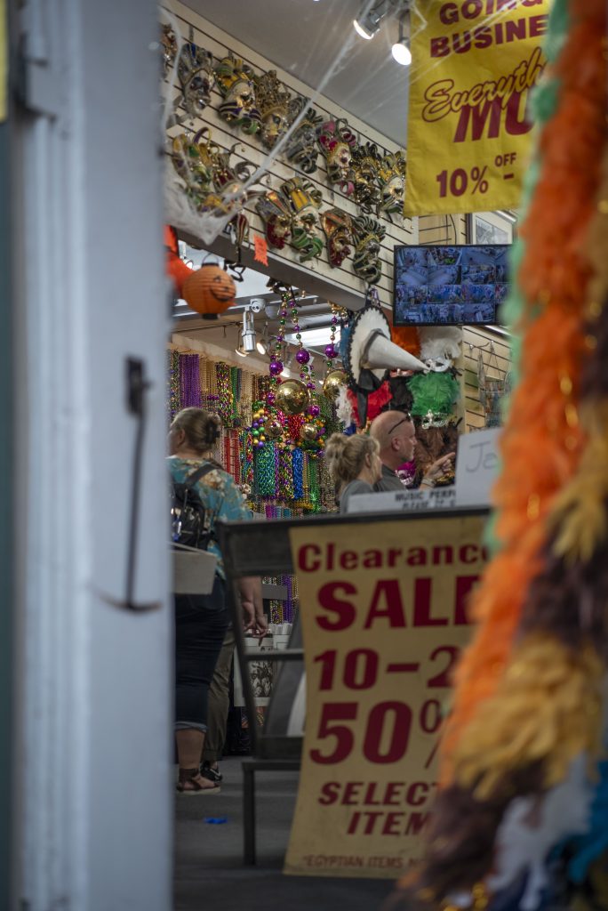 Stepping into one of the many trinket shops along the streets in the French Quarter, one can find beads, masks, and colorful boas. Photographed by Emily Chandler/BruinLife.