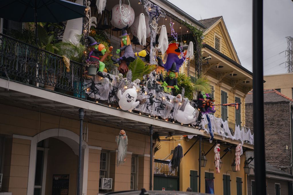 Apartments and shops lining the French Quarter deck out their balconies in Halloween decorations. All the ghosts, witches and spiders lit up the night and added to the fun Halloween festivities. Photographed by Emily Chandler/BruinLife.