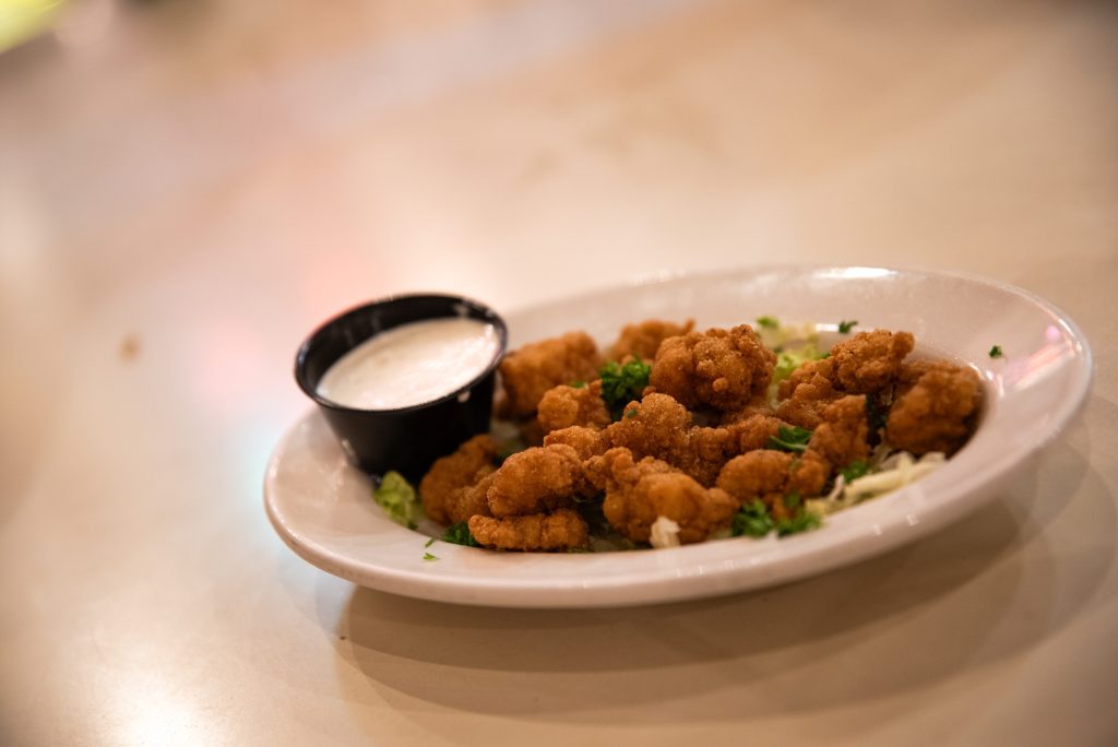 The fried gator is served with a ranch dip. This unique appetizer is a light but fulfilling way to begin your meal.  Photographed by Finn Martin/BruinLife.