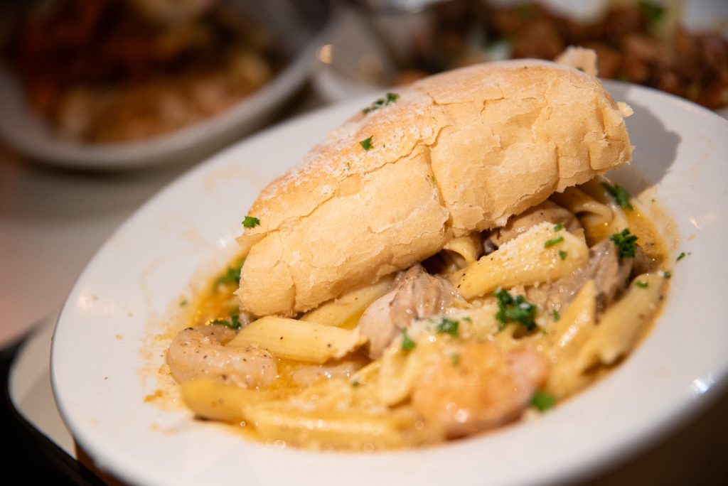 The buttery pasta Felix is served with a shrimp scampi that will please seafood lovers.  Photographed by Finn Martin/BruinLife.