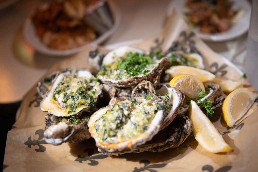 The Oyster Rockefeller at Felix's is prepared with a house made garlic butter that pairs wonderfully with the creamy spinach. Photographed by Finn Martin/BruinLife.