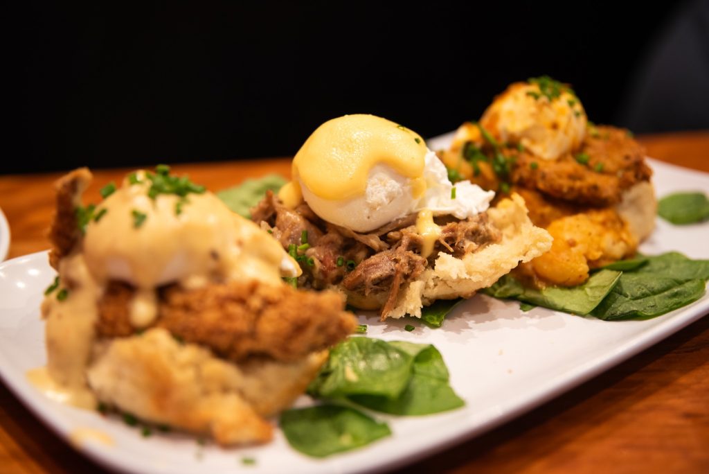 Chicken St. Charles with lightly battered fried chicken, doughy biscuits, cheesy sauce and eggs. Photographed by Finn Martin/BruinLife.