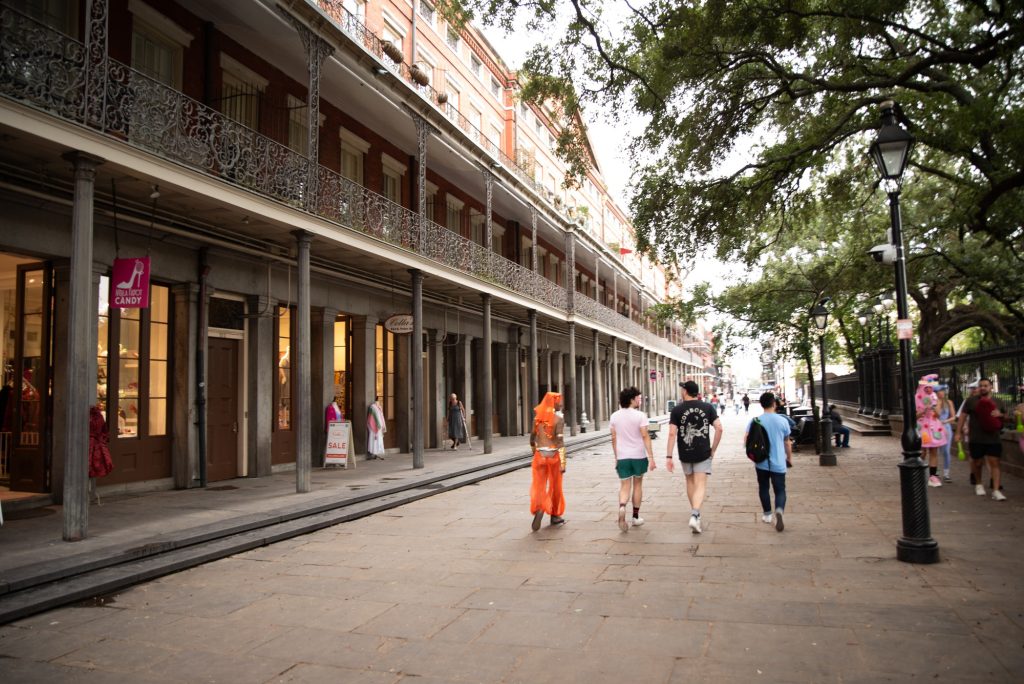 The arcades along Jackson Square, a historic city center of New Orleans, present a multiplex of shopping options: running the gamut from articles and wares to coffee and beignets. As New Orlean's biggest historic landmark, Jackson Square was the location at which the Louisiana Purchase took place. Photographed by Finn Martin/BruinLife.