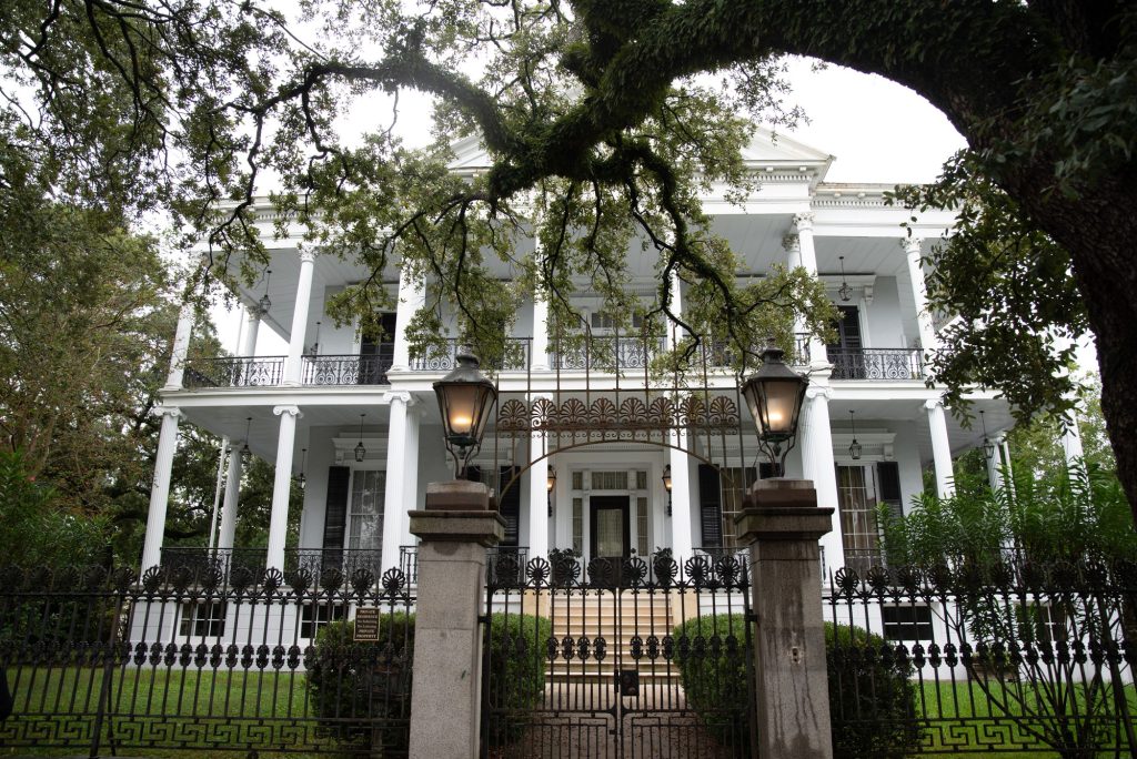 The Garden District's Buckner Mansion dates back to the 19th century and was constructed by a wealthy cotton planting family.  The estate was famously featured as a witchery school in the third season of American Horror Story. Photographed by Finn Martin/BruinLife.