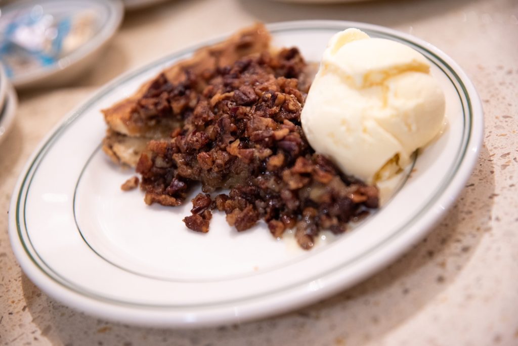 The plentiful pecan pie with a scoop of vanilla ice cream to help wash it down.  Photographed by Finn Martin/BruinLife.