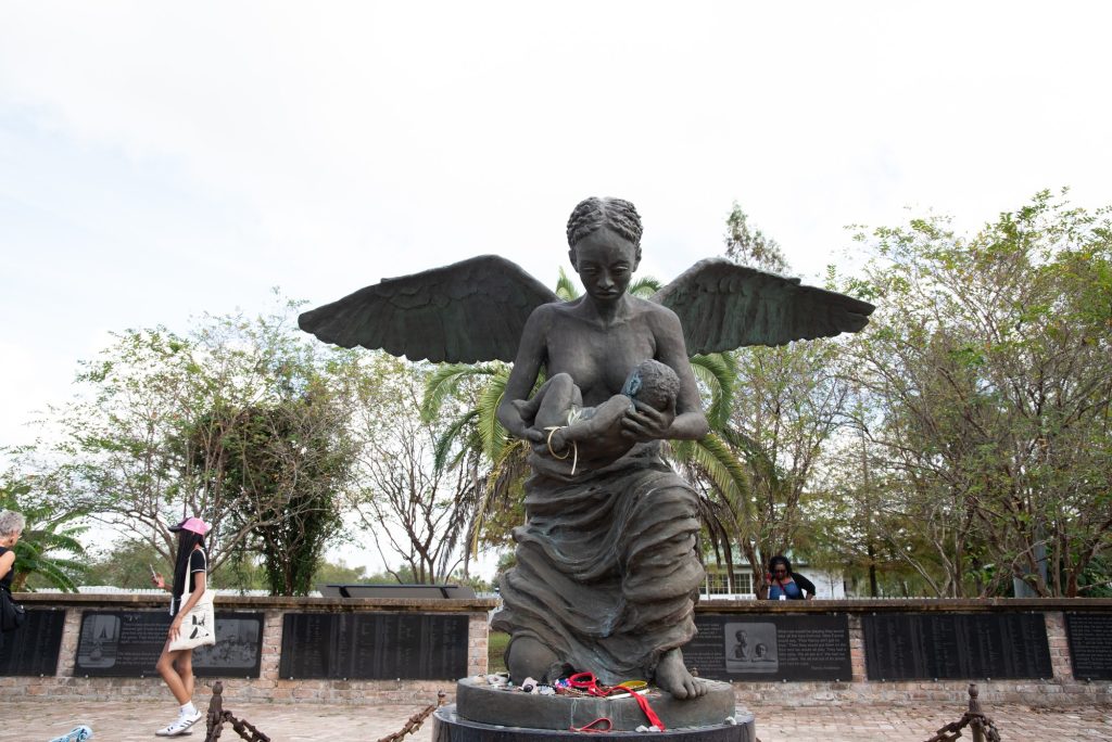 An angel cradles an enslaved child in the end memorial to the Whitney Plantation tour.  Photographed by Finn Martin/BruinLife.