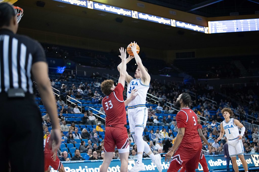 Tyler Bilodeau rises for a contested jumper against Southern Utah's defense during a hard-fought game at Pauley Pavilion.