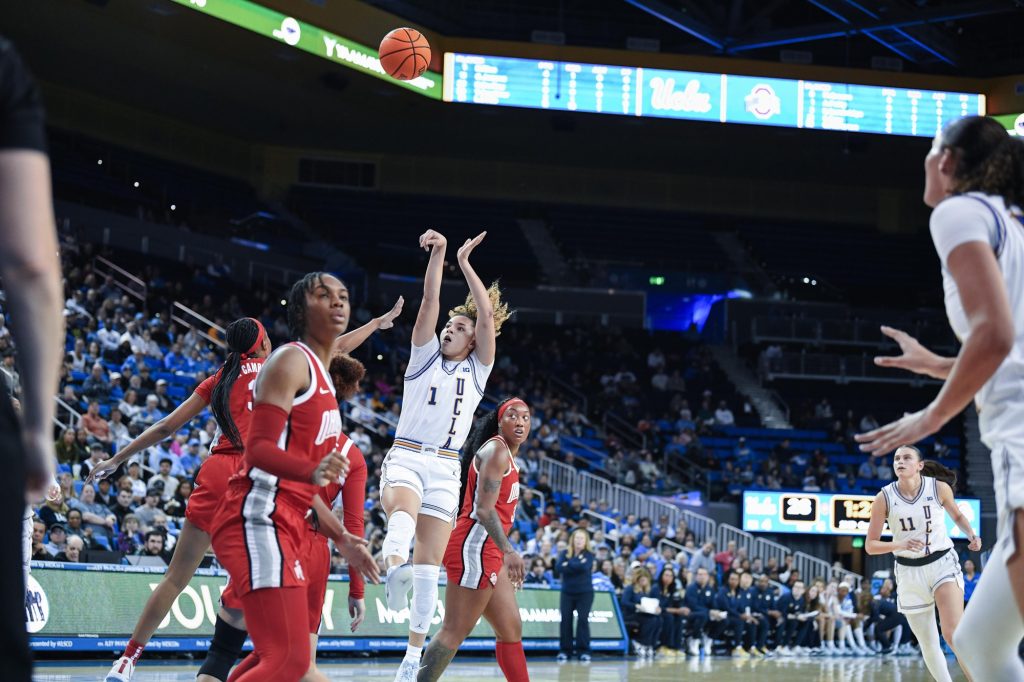 UCLA’s Kiki Rice pulls up in the paint over the Ohio State defense. Rice, a junior guard, wears number one for the Bruins.
Photographed by Ryan Zhang/BruinLife