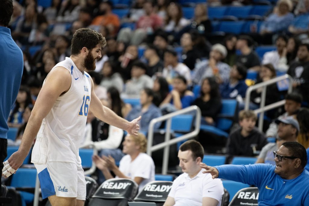 Ido David celebrates another strong game. The senior player continued his stellar performance this season, bringing in six kills, four aces, and one block for UCLA.