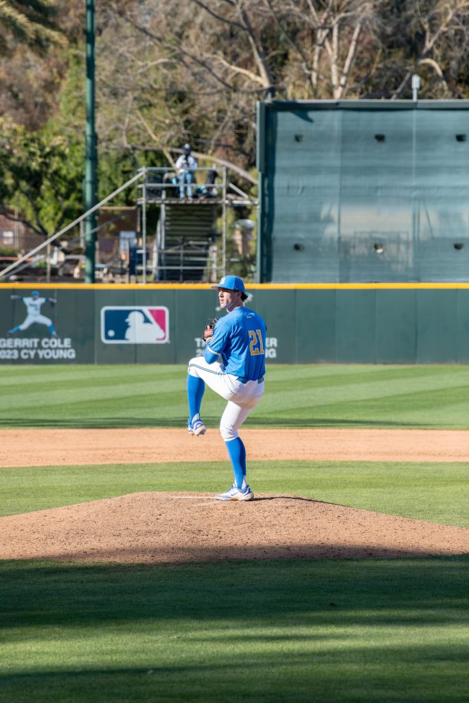 UCLA Pitcher 21. Josh Alger positions himself to pitch against Nebraska batter. He created two strikeouts against Nebraska today.