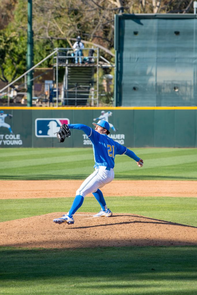 UCLA Pitcher 21 Josh Alger is about to throw the baseball towards Nebraska batter. His IP value totaled to 1.2 during today's game.