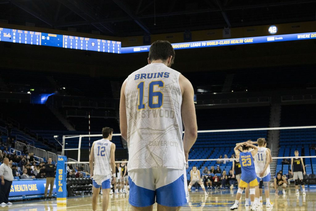 Ido David prepares to serve up yet another ace against the Lions. The senior recorded a season high of four aces during the Bruin sweep of Vanguard. Photographed by Regan Rhodes/BruinLife