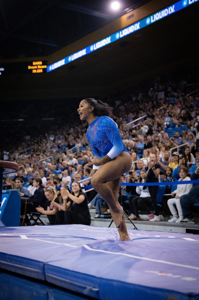 Jordan Chiles screams in celebration as she nails the landing on her vault routine. Photographed by Cathryn Kuczynski/BruinLife.