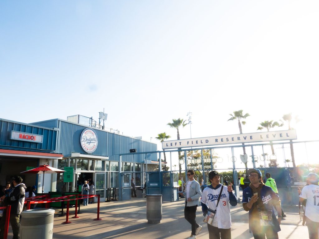Baseball fans bowl their way through the left field entrance to watch the Dodgers take on the Marlins. Photographed by Gavin Meichelblock/BruinLife.