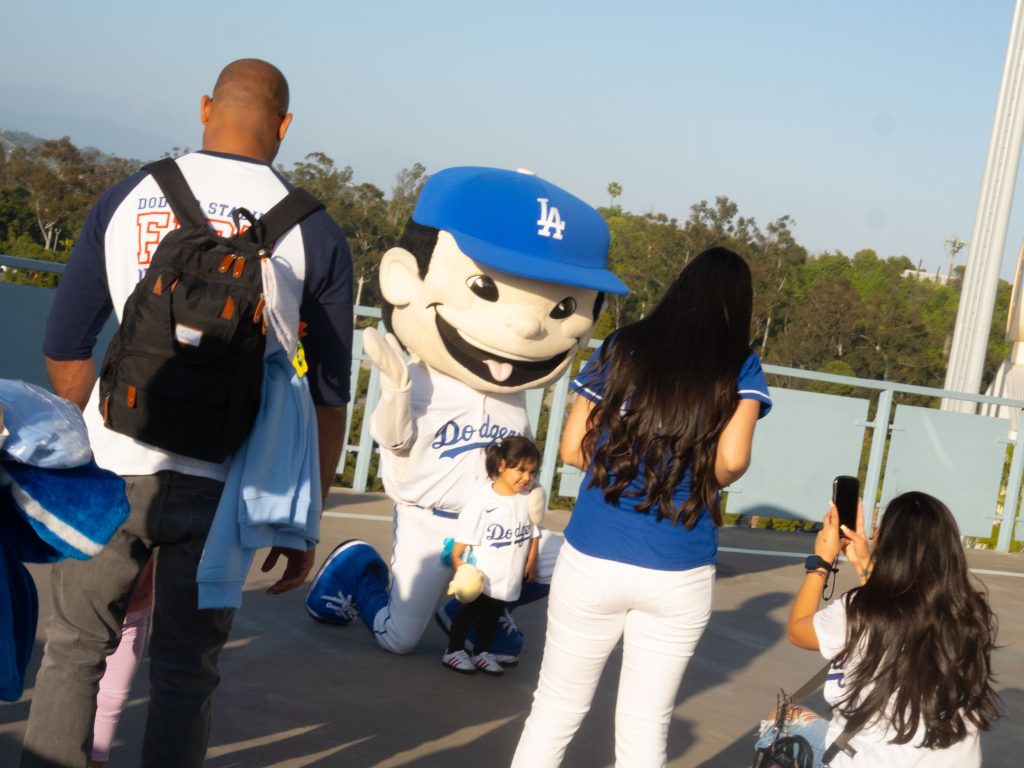 It's alive! Dodgers mascots stroll the stadium posing for photos. Photographed by Gavin Meichelblock/BruinLife.
