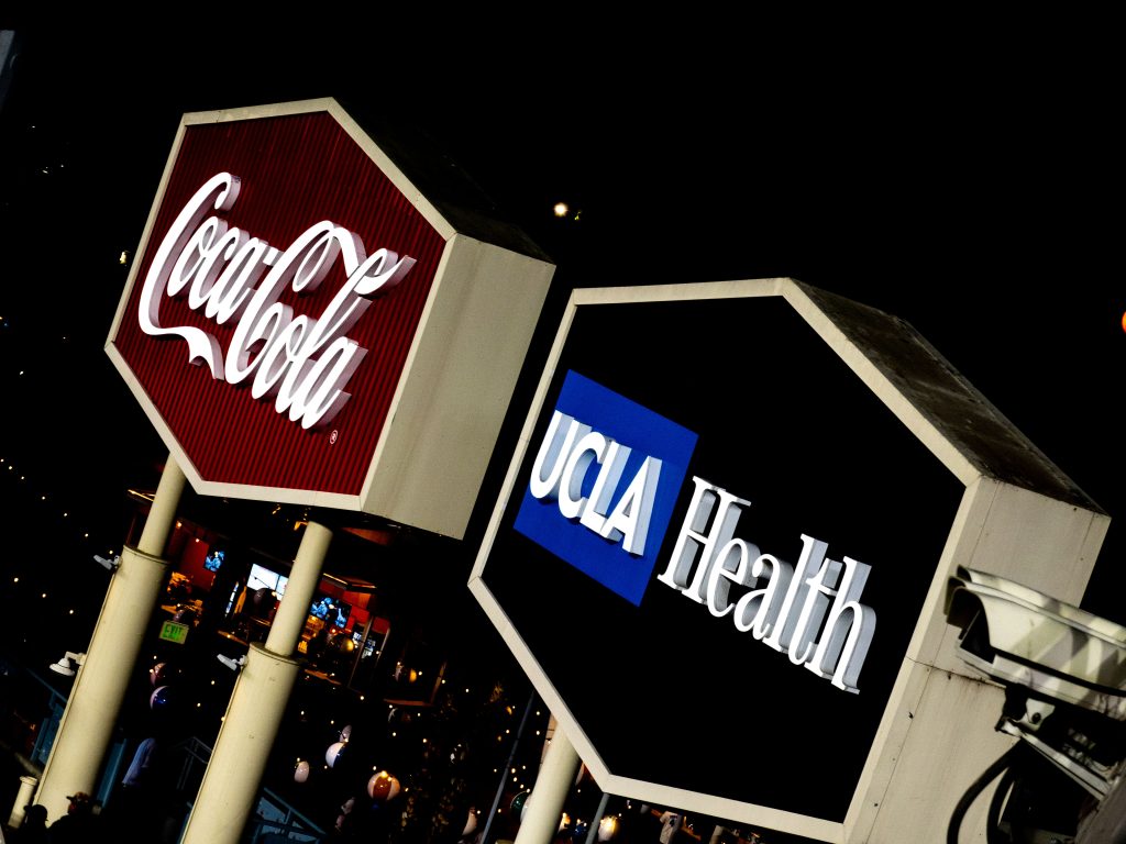 UCLA Health juxtaposed with CocaCola. Proud to say that Bruins sponsor the Dodger blue. Photographed by Gavin Meichelblock/BruinLife.