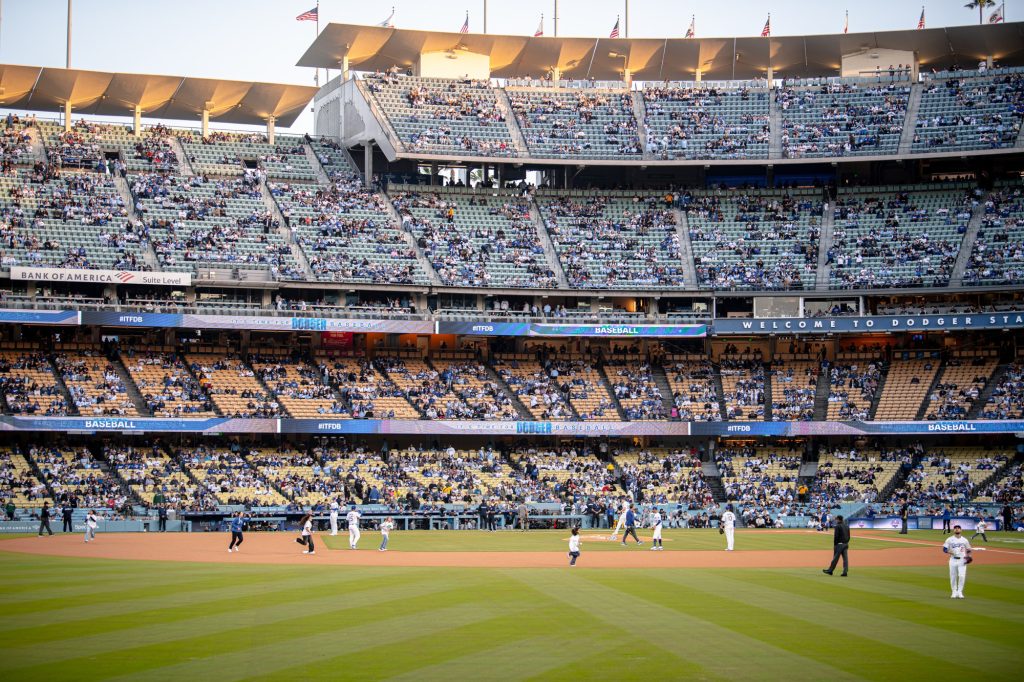 Kids rush the field at Dodgers Stadium before first pitch.  Photographed by Finn Martin/BruinLife.