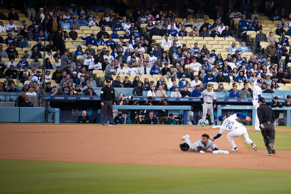 A tough slide at second.  Photographed by Finn Martin/BruinLife.
