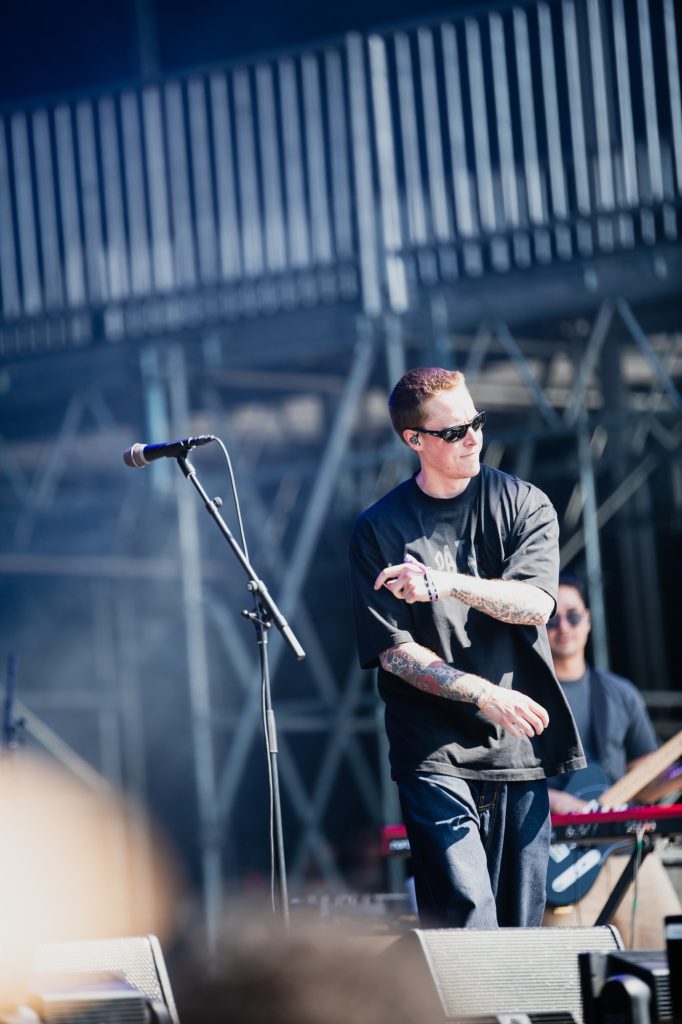 Parker Cannon is all smiles on stage, clearly having a good time with the crowd. Photographed by Ryan Zhang/BruinLife.