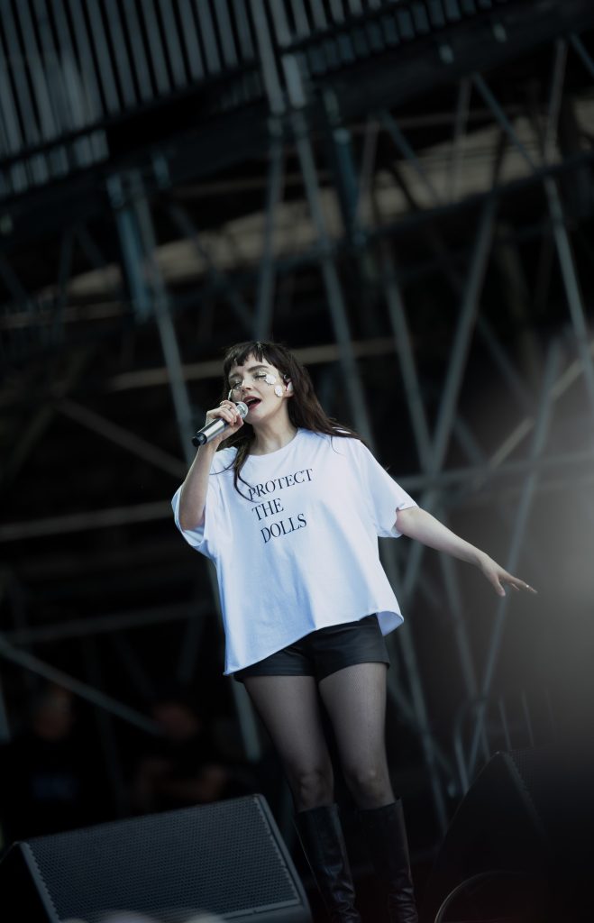 Eyes closed, heart open—Lauren Mayberry loses herself in the music. Photographed by Ryan Zhang/BruinLife.
