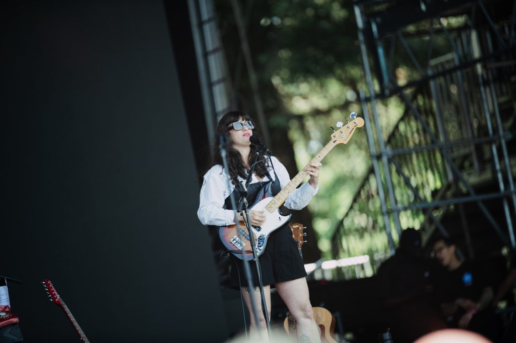 Locked into the low end, the bassist drives the pulse behind Lauren Mayberry’s soaring vocals. Photographed by Ryan Zhang/BruinLife.