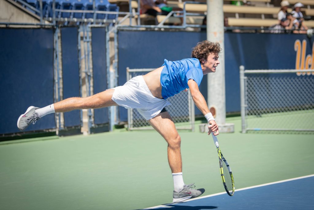 The ball is served in the doubles game at court one. Photographed by Sapna Drew/BruinLife.