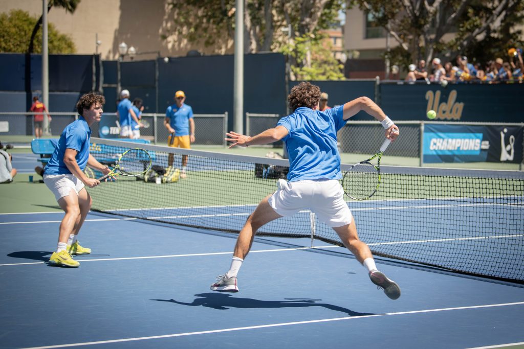 Players volley at court one. Photographed by Sapna Drew/BruinLife.