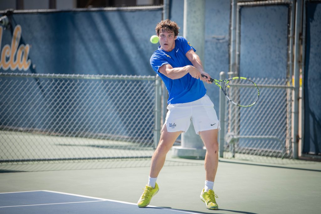 Alexander Hoogmartens keeps his eyes on the ball as he prepares to swing. Photographed by Sapna Drew/BruinLife.