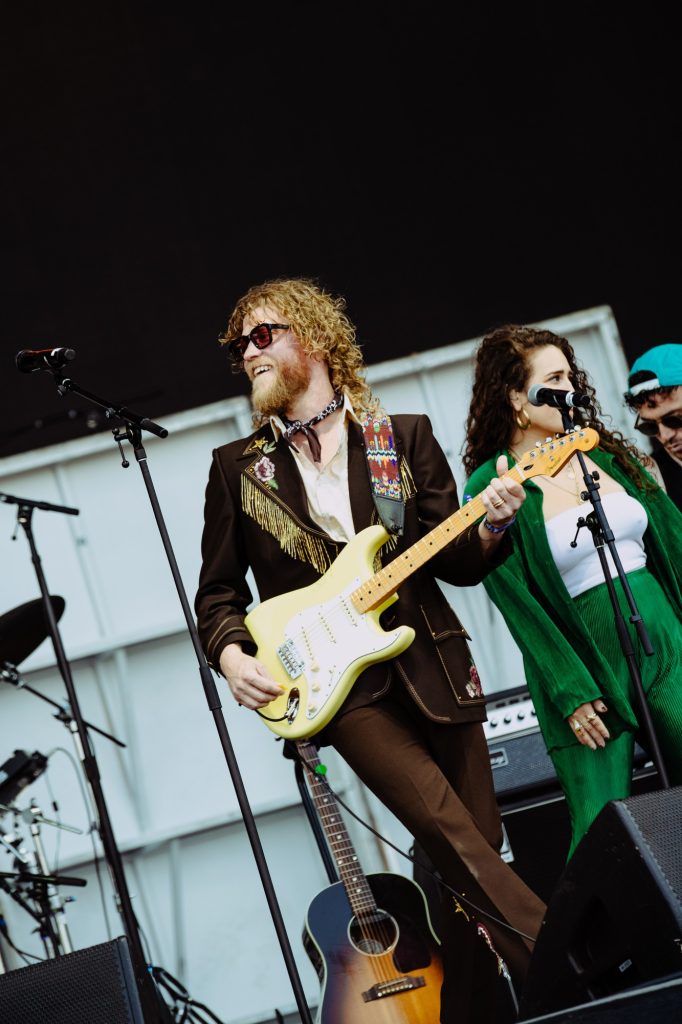Allen Stone flashes a bright smile between songs, soaking in the crowd’s energy. Photographed by Ryan Zhang/BruinLife.