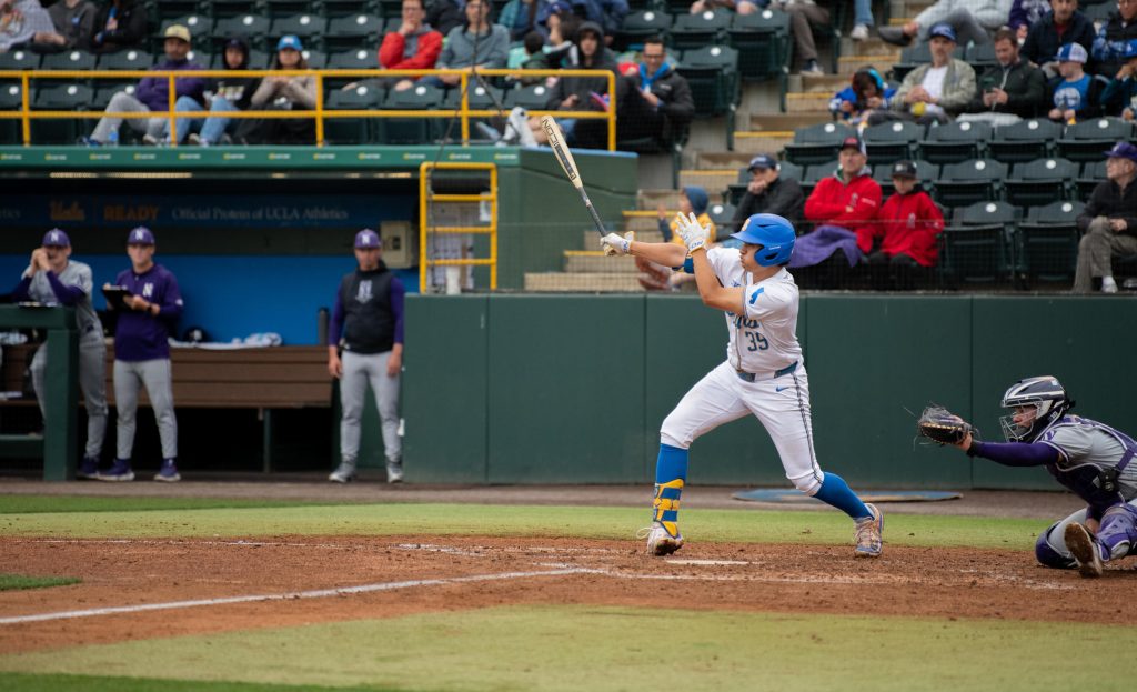 Mulivai Levu looks out after unleashing a swing in the third inning. Photographed by Maia Salti/BruinLife Photographed by Maia Salti/BruinLife