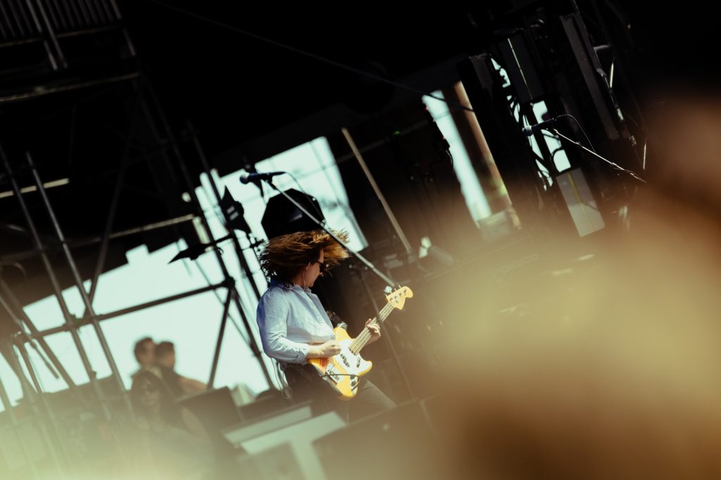 Jake Johnson holds down the groove with smooth, steady basslines during Vacations’ BottleRock set. Photographed by Ryan Zhang/BruinLife.