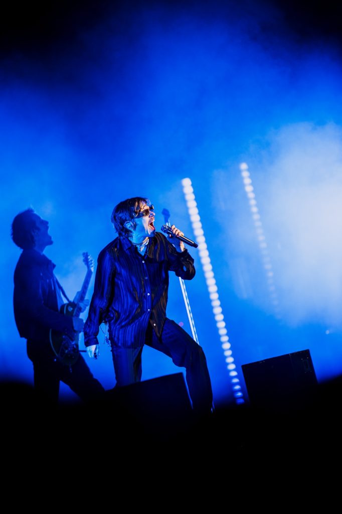 Matt Shultz of Cage the Elephant bursts onto the stage with high-energy charisma and wild theatrics. Photographed by Ryan Zhang.